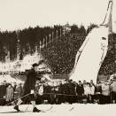 King Olav skiing in front of Holmenkollen 1963 (Photo NTB / The Royal Court Photo Archives)